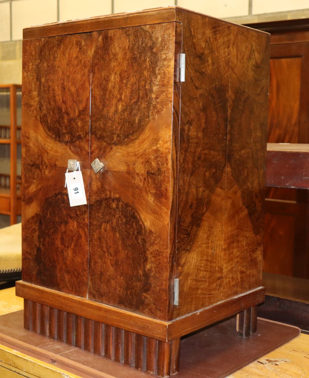 A French Art Deco marble topped burr walnut bedside cabinet, W.44cm, D.35cm, H.69cm